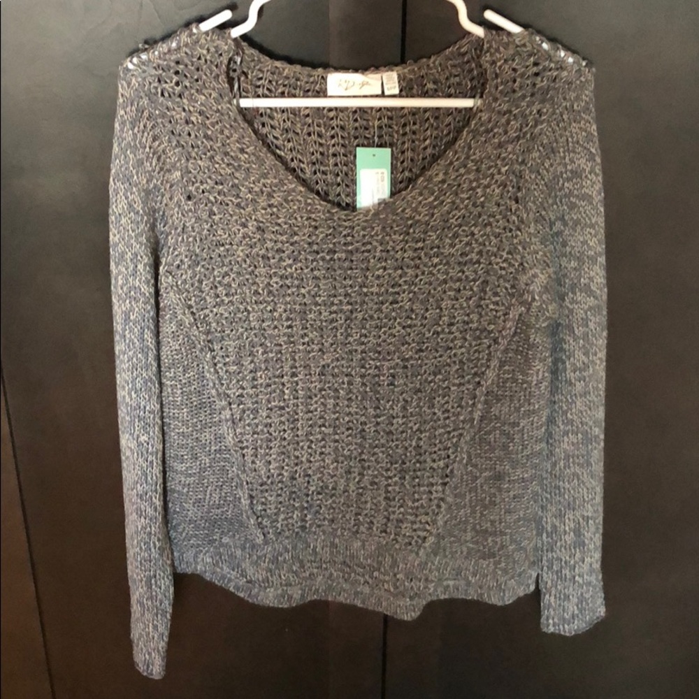 Blue grey sweater.